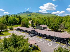 an aerial view of a building with a parking lot at Wolfjaw Lodge in Wilmington