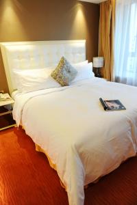 Imagem da galeria de Wealthy All Suite Hotel Suzhou em Suzhou