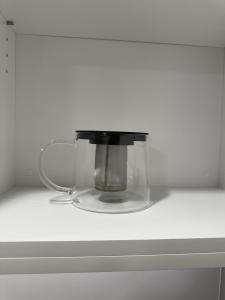 a food processor sitting on a white counter top at Executive suite in Surrey