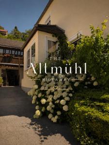 a building with a sign that reads the almuth library at Altmühl Hideaway Apartment 2 in Treuchtlingen