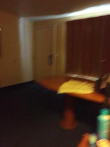 a blurry picture of a room with a bed at Knights inn hotel in Jacksonville