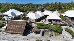 an aerial view of a house with a roof at Vahaui Paradis in Avatoru
