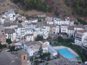 an aerial view of a town with a swimming pool at Casa Solana in Cambil