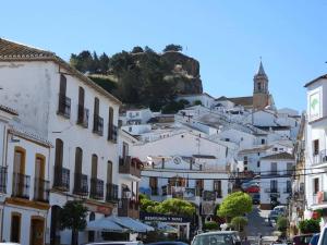 a view of a town with white buildings at Casa la parra in Ardales