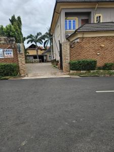 an empty street in front of a house at GRACECUT HOTEl in Enugu