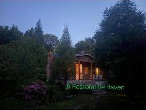 a house in the middle of a forest at Rimaaia homestay in Lāitlyngkot
