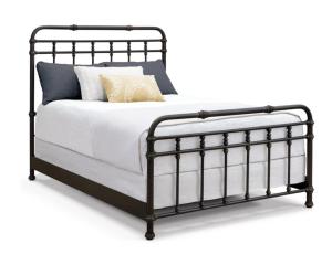 a black metal bed with white sheets and pillows at Donde Gareth in Matina