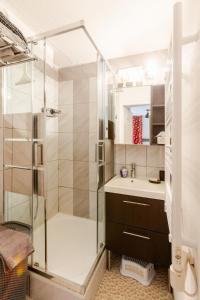 a bathroom with a shower and a sink at Appartement T2 Chalets Superd in Le Dévoluy +15 photos