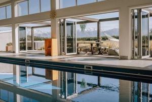 a house with a swimming pool in the middle at Alpine Retreat in Methven