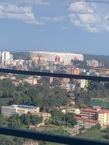 a view of a city with a bridge in the background at Tsavo Rising in Nairobi
