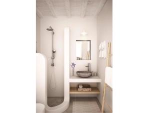 a bathroom with a shower and a sink at Serifos Blue in Rámos