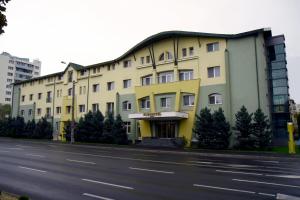 
a large building with a lot of windows on the side of it at Eurohotel in Baia Mare
