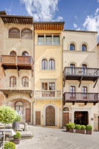 an exterior view of a building with balconies at Arezzo Centre, Prestigious Apartment with a View in Arezzo