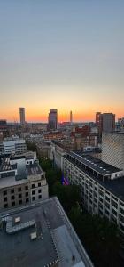 a view of a city skyline at sunset at Shivay harmony in Birmingham