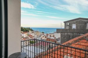 a view of the ocean from the balcony of a building at Hana boutique apartments in Ulcinj