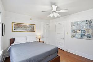 a bedroom with a bed and a ceiling fan at Golden Hill 1 bedrooms in San Diego