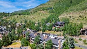 an aerial view of a resort with a mountain at Serenity by the Slopes in Vail