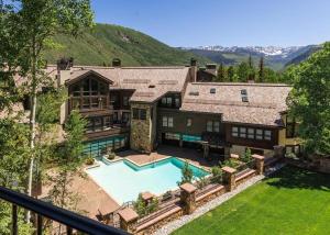 an aerial view of a house with a swimming pool at Northwood's Juniper 311 condo in Vail