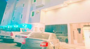 a group of cars parked in front of a building at فندق دار العوالي3 in Medina