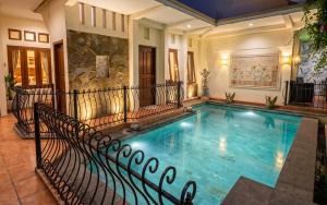 a swimming pool in a house at GWK View Boutique Hotel and Serviced Residence in Jimbaran