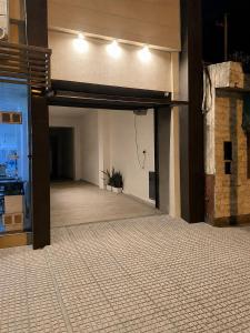 an empty room with a garage in a building at Hotel Andino in La Rioja