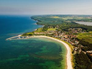 an aerial view of a small island in the water at Ferienhaus Strandnah - Ostseeurlaub in Glowe in Top-Lage in Glowe
