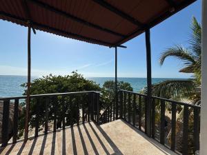 a balcony with a view of the ocean at La Casa de la Tortuga in San Onofre