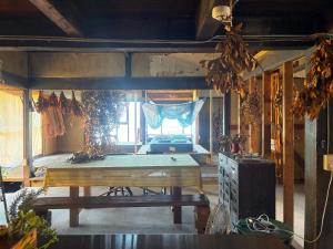 a room with a bed and a table in it at Lemon tree hotel in Higashiura +46 photos