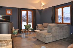 Χώρος καθιστικού στο Chalet Rouge ou Blanc