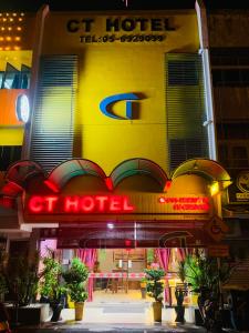 a hotel with a sign that reads c hotel at Ct Hotel in Sitiawan