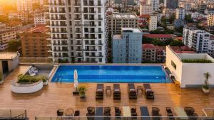 a swimming pool on the roof of a building at OCEAN HOTEL in Phnom Penh