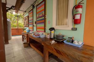 a kitchen with a counter with food on it at ไข่ปูพูลเกาะล้าน in Ko Larn