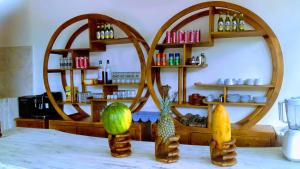 a counter with three different types of vegetables on a table at La Gautch Bungalow in Nusa Lembongan