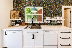 a kitchen with a sink and a window at LeWeber Haus in Leavenworth +62 photos
