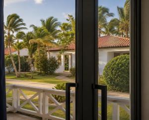 a view of a house from a window at Costa lisa in Cabarete