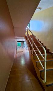 a staircase leading up to a building with a window at Costa lisa in Cabarete