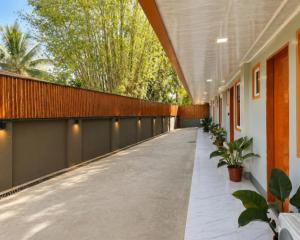 an empty corridor in a building with plants at Casa Amul in Tigbawan