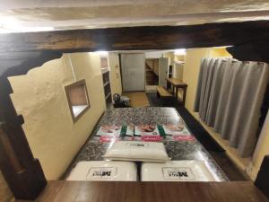 a view from above of a room with a bed at Sanjhyā Durbar Homestay in Bhaktapur