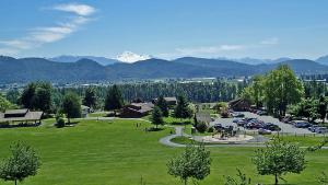 a view of a park with a mountain in the background at Guest Suite in Mission in Mission