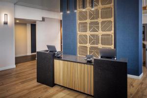 an office with two laptops on top of a desk at Hyatt Place Dublin/Pleasanton in Dublin +25 photos