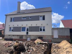 a house under construction with a pile of rubble at Hakro Jevisovka in Jevišovka