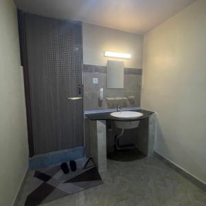 a bathroom with a sink and a shower at Anamnagar Union House in Kathmandu +22 photos
