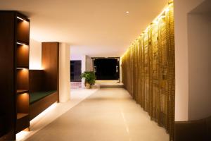a corridor of a hotel with a long hallway at Aeon Blue in Selianitika