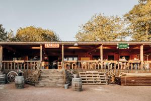 a building with a restaurant with people in it at Guest house Western-city in Chaudfontaine