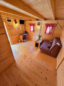 an overhead view of a living room in a log cabin at Rafting centar RT in Foča