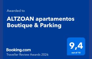 a blue sign with the words alzheimer apartments boutique and parking at ALTZOAN Apartamentos Turísticos y aparcamiento gratuito in Zarautz