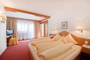 Et tv og/eller underholdning på Hotel Jagdhof Bed & Breakfast