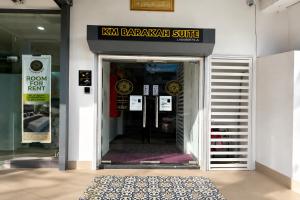 a front door of a store with a sign on it at KM Barakah Suite Kuala Terengganu in Kuala Terengganu +31 photos