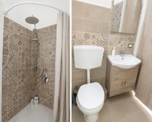 a bathroom with a toilet and a sink at Nel cuore di Segesta in Calatafimi +19 photos