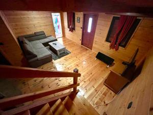 an overhead view of a living room with a couch at Vikendica Veruša in Veruša
